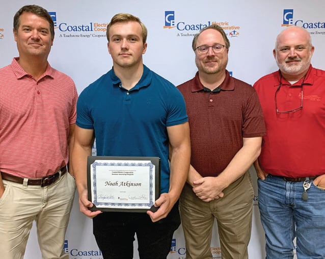 From left, Engineering Manager Chris Williams, Noah Atkinson, Vice President of Engineering and Operations Brian Hayes and Operations Manager Jake Horton.