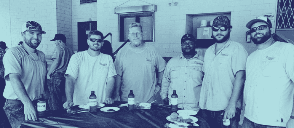 Co-op workers are seen enjoying a barbecue