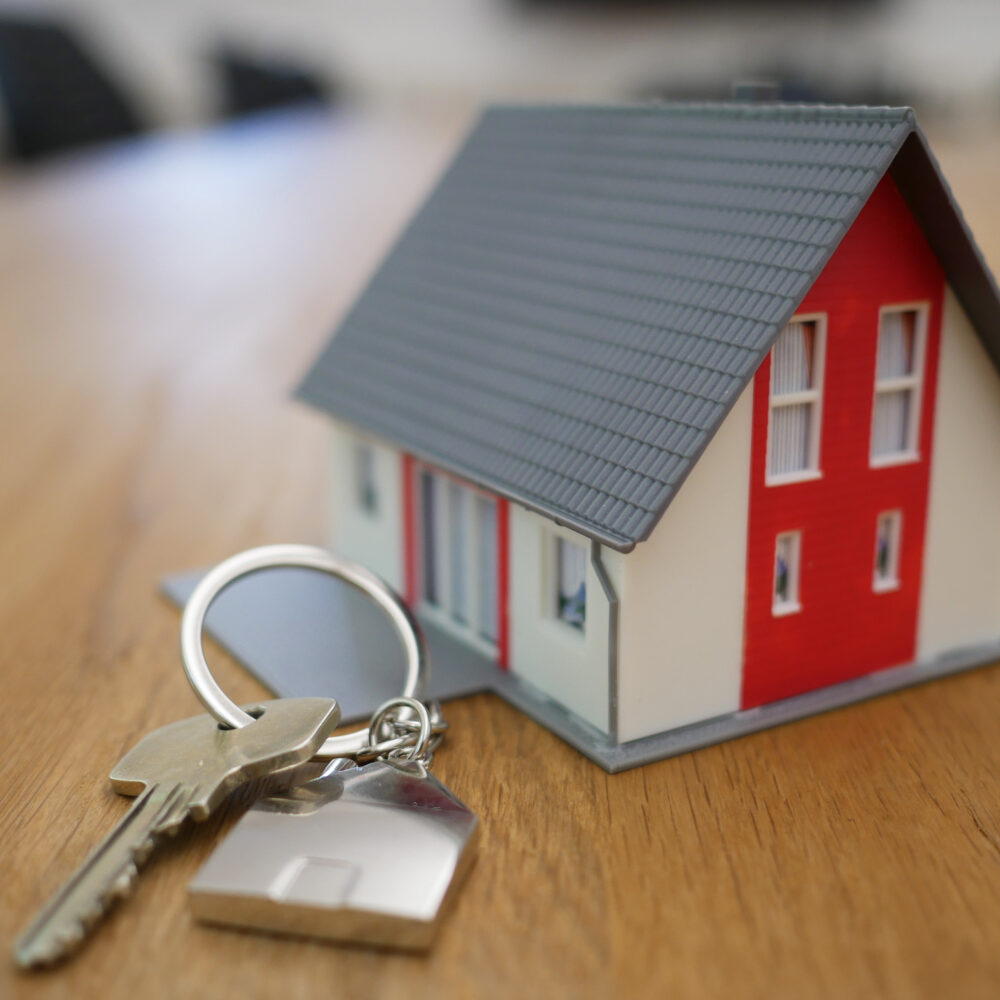 Energy programs are represented by a photo of a miniature house and keys