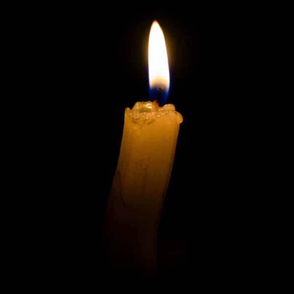 A candle is burned during an outage
