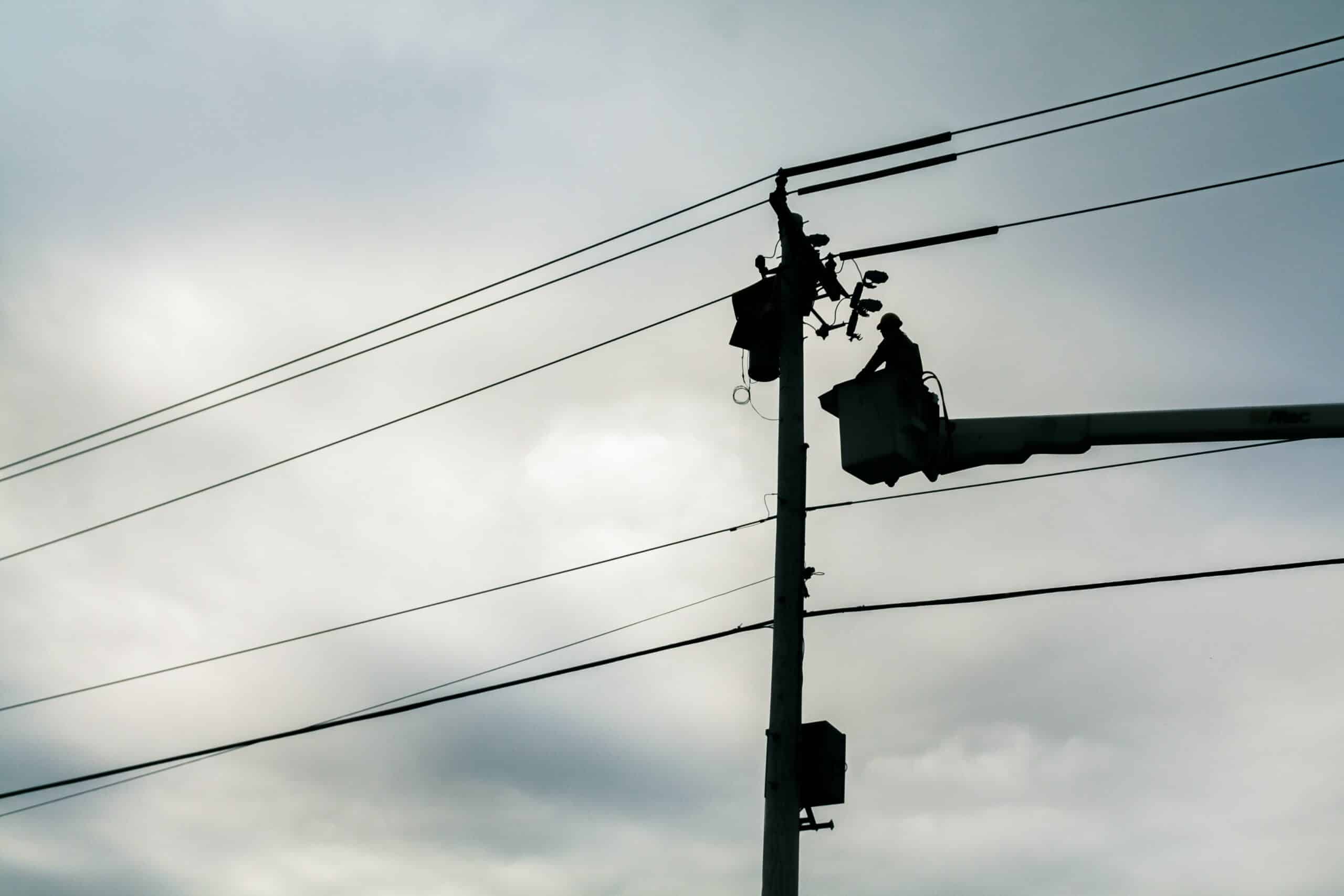 Workers restore power lines