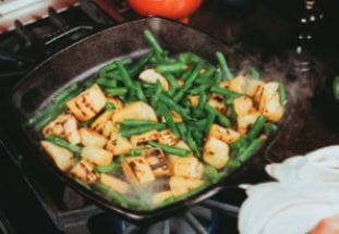 Grilled veggies are pictured with pasta