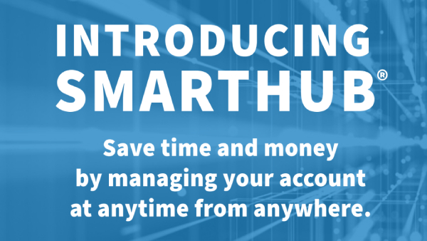 The image promotes SmartHub, emphasizing time and cost savings by managing accounts remotely. Background features abstract digital network graphics.